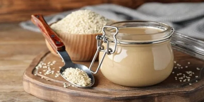 ارده گیری کنجد در حضور مشتری|کره گیری بادام در حضور مشتری|کره گیری بادام در حضور مشتری